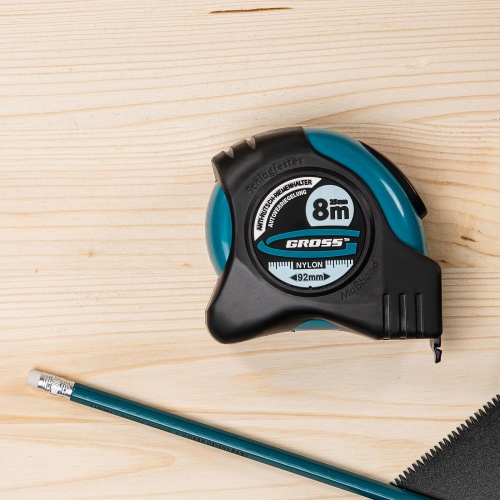 Рулетка "Schlagfest",8 м x 25 мм,магнитный обрезиненный зацеп,двусторонняя шкала,Нейлоновое покрытие,автоматическая фиксация Gross фото 5