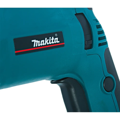Двухскоростная ударная дрель Makita HP 2070 F фото 5 Двухскоростная ударная дрель Makita HP 2070 F фото 5