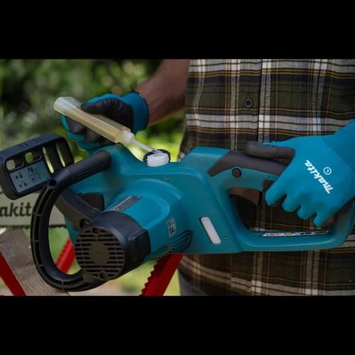 Электрическая цепная пила Makita UC4041A фото 5 Электрическая цепная пила Makita UC4041A фото 5